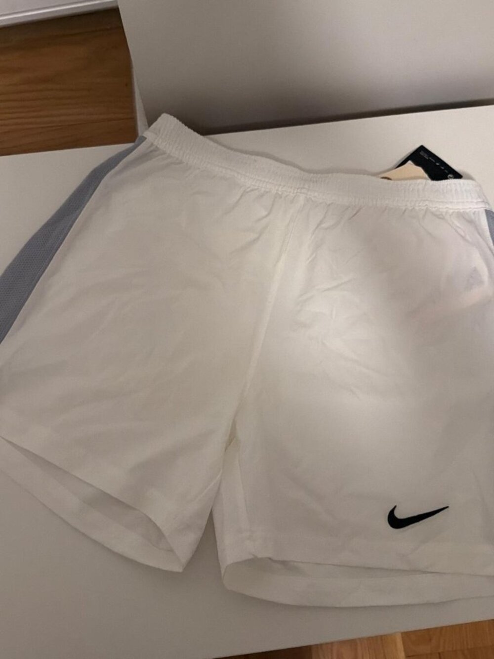 Nike white shorts with gray side panels